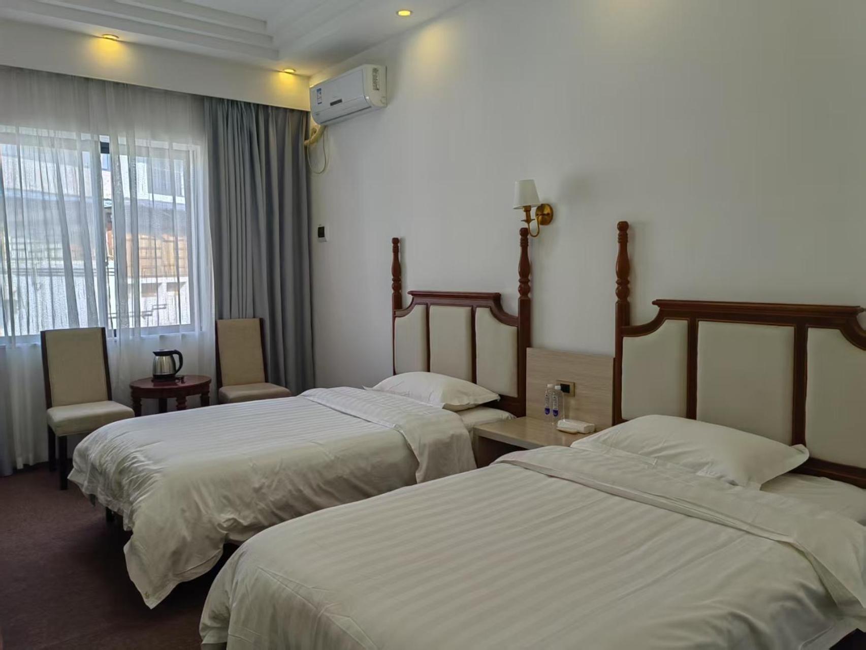 Serene Vale Inn Guilin-Free One Way Pick Up Service To High-Speed Railway Station For 2 Nights Room photo
