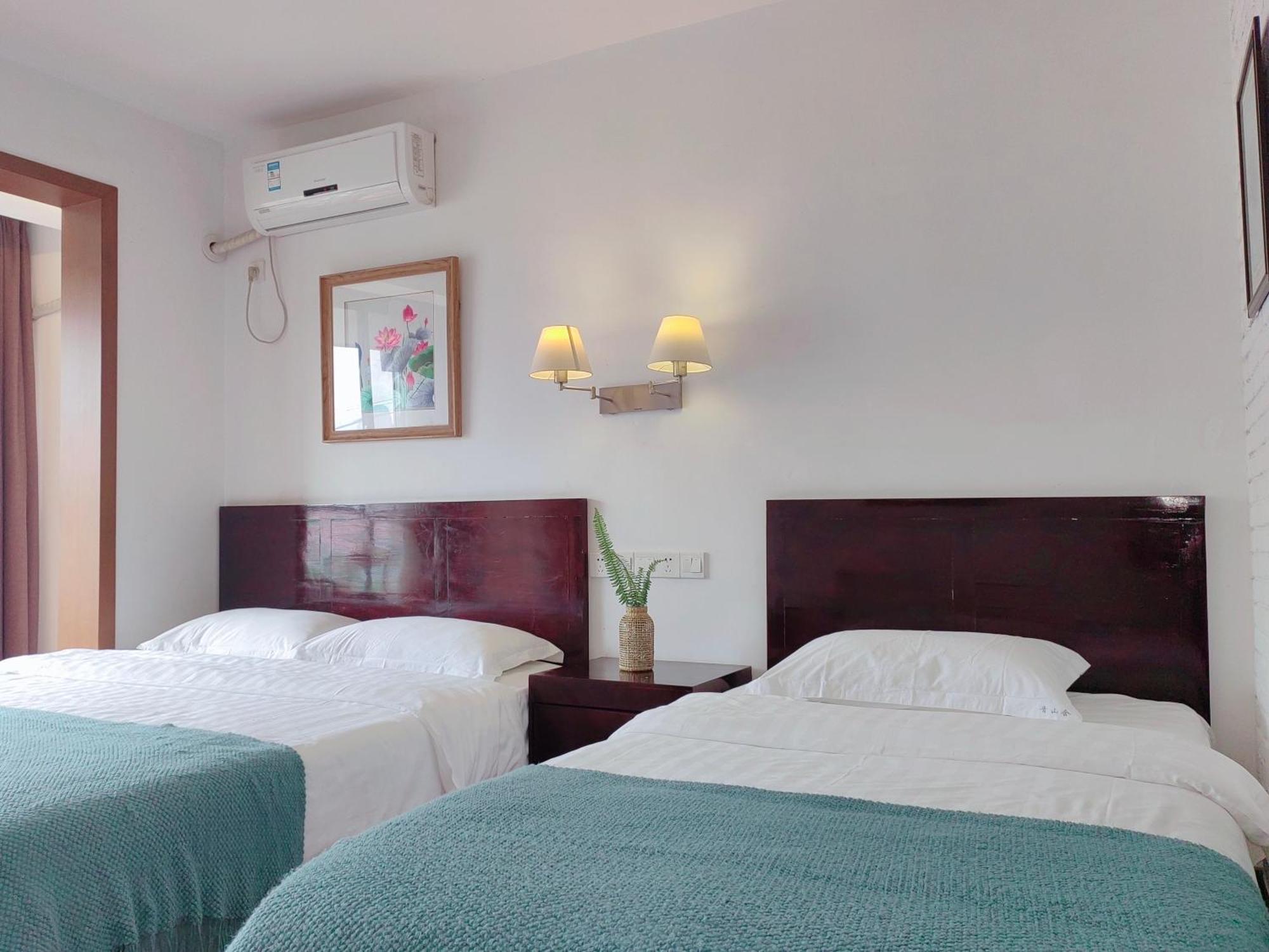 Serene Vale Inn Guilin-Free One Way Pick Up Service To High-Speed Railway Station For 2 Nights Room photo